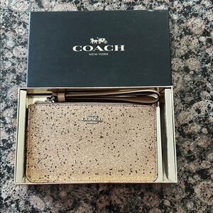 NIB Coach Glitter Stars Gold Wristlet elegant
